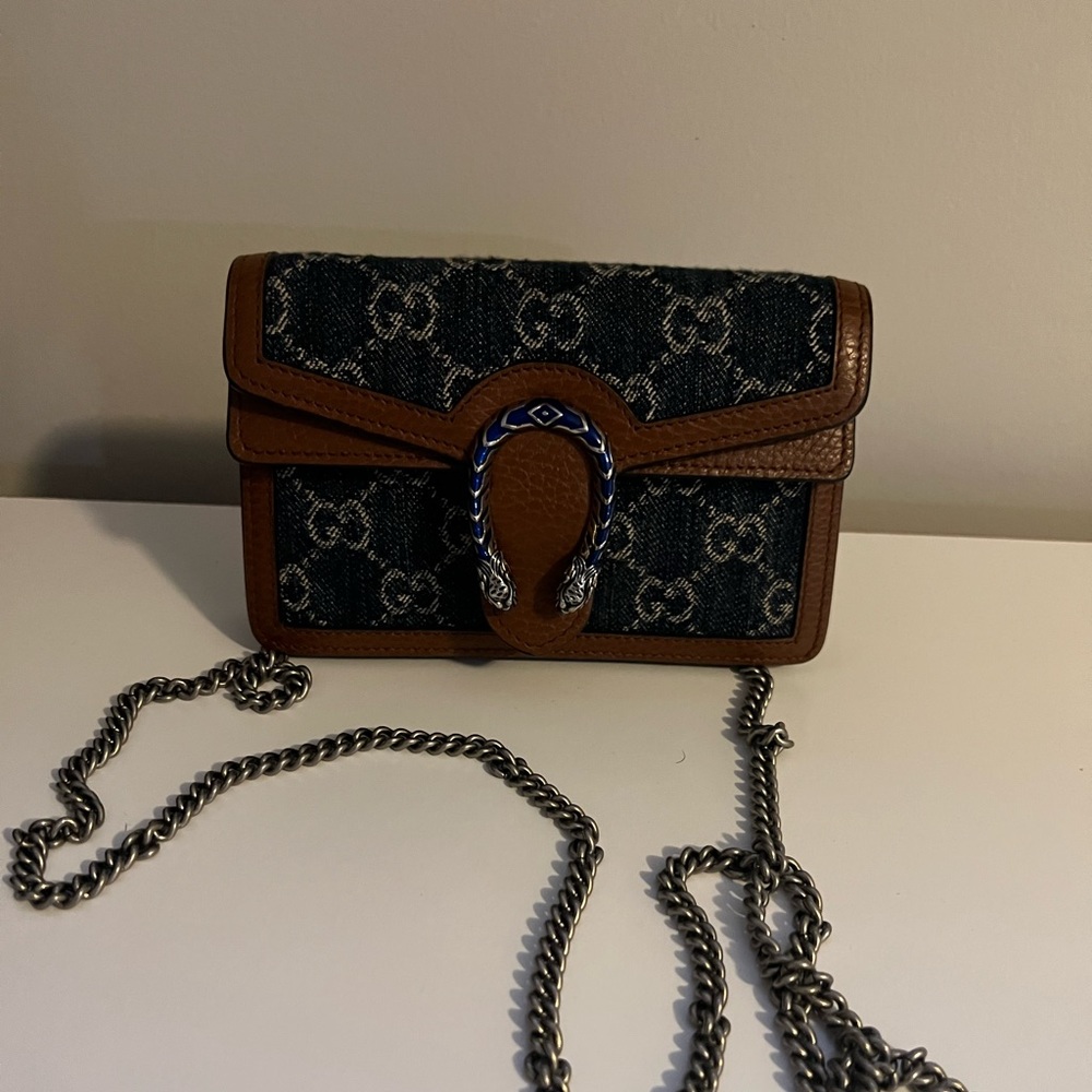 Gucci mini ! Like brand new ! Dust bag included
